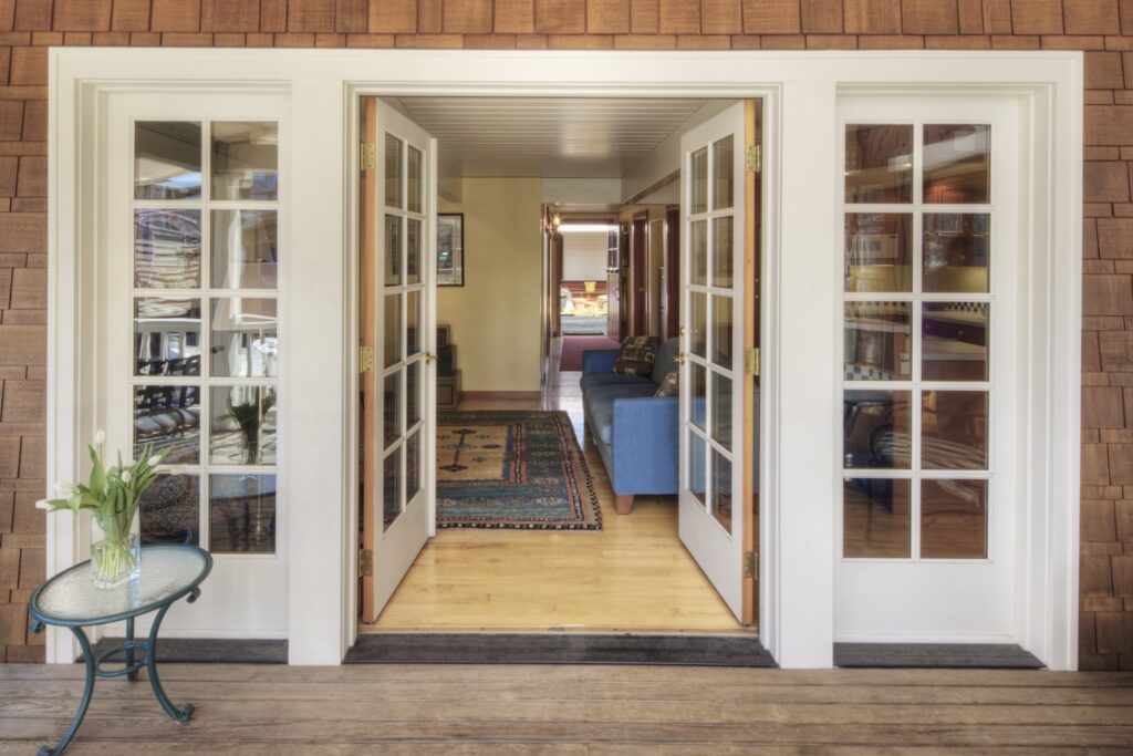 54476 glass doors on wooden patio 2025 04 04 00 10 54 utc e1752201505134